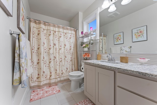 bathroom with vanity, tile patterned flooring, toilet, and a shower with shower curtain