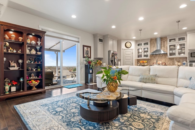 living room featuring dark hardwood / wood-style flooring