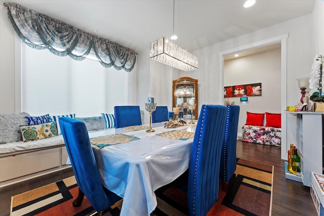 dining room with dark hardwood / wood-style floors