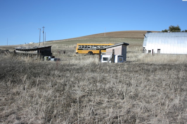 exterior space featuring a rural view