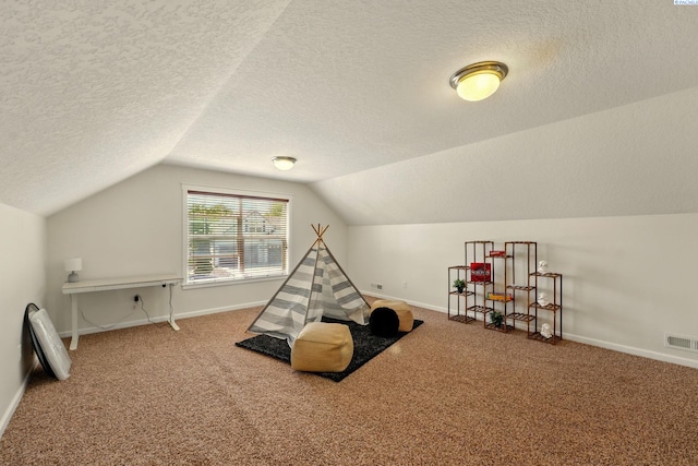 6117 Dorchester Ct, Pasco, WA 99301 - game room with carpet, lofted ceiling, a textured ceiling, and baseboards