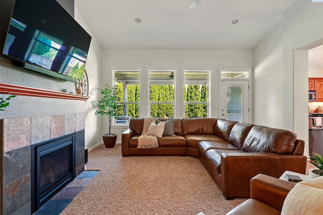 6117 Dorchester Ct, Pasco, WA 99301 - carpeted living room with a fireplace, baseboards, and recessed lighting