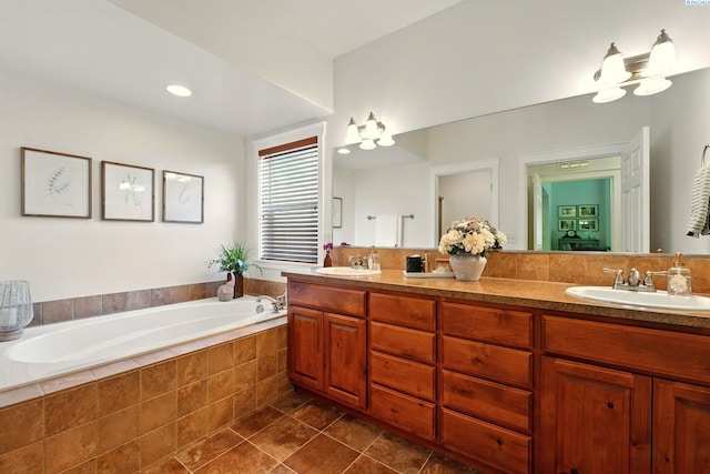 6117 Dorchester Ct, Pasco, WA 99301 - full bath featuring a bath, double vanity, and tile patterned flooring