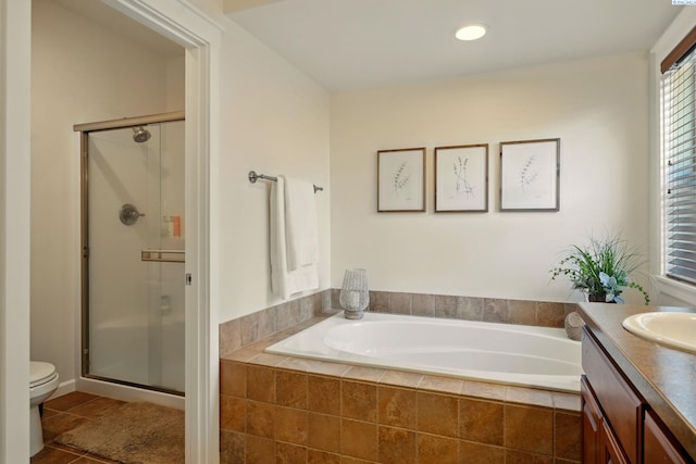 6117 Dorchester Ct, Pasco, WA 99301 - full bath featuring a shower stall, vanity, a garden tub, toilet, and recessed lighting