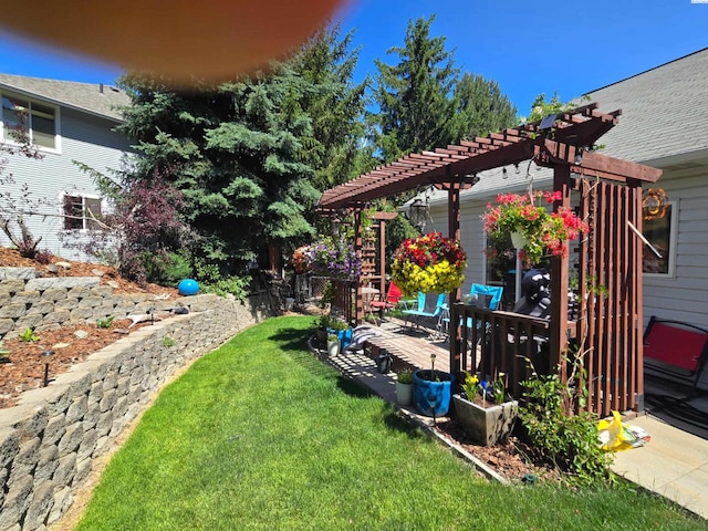 2065 NW Turner Dr, Pullman, WA 99163 - view of grassy yard featuring a pergola and a wooden deck