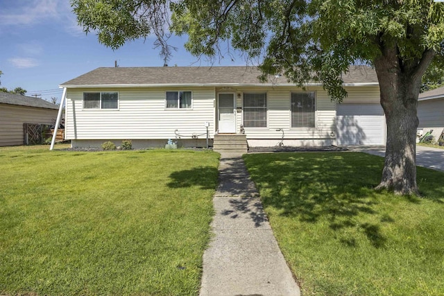 2017 Everest Ave, Richland, WA 99354 - ranch-style home with a front yard and an attached garage