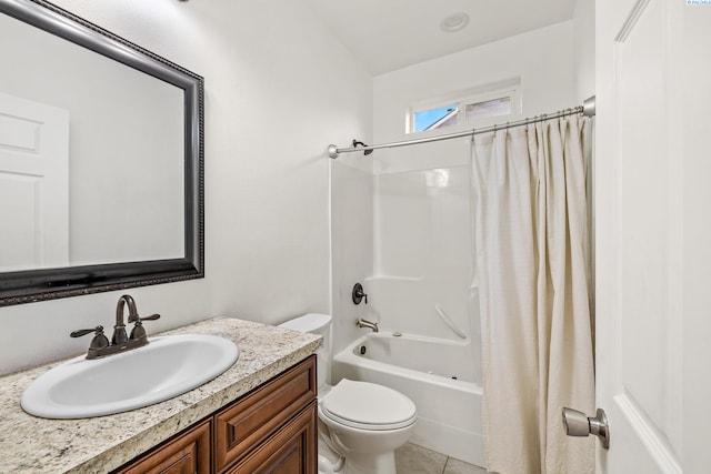 bathroom with toilet, vanity, shower / bath combo, and tile patterned floors
