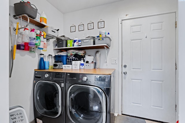 laundry room featuring laundry area and washing machine and clothes dryer