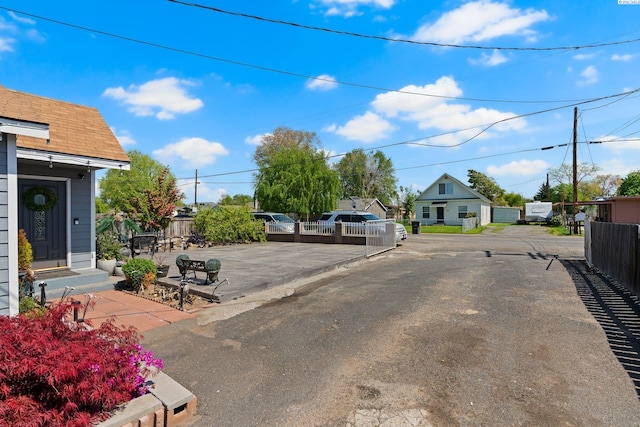 view of road with aphalt driveway