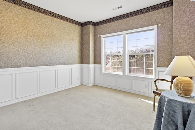 living area with light colored carpet