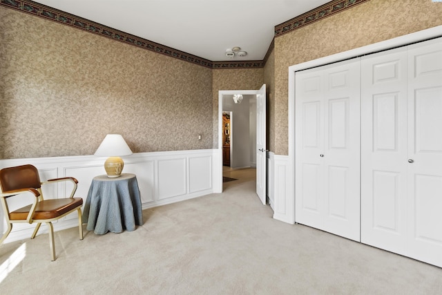 living area with light colored carpet