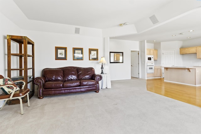 living room with light carpet