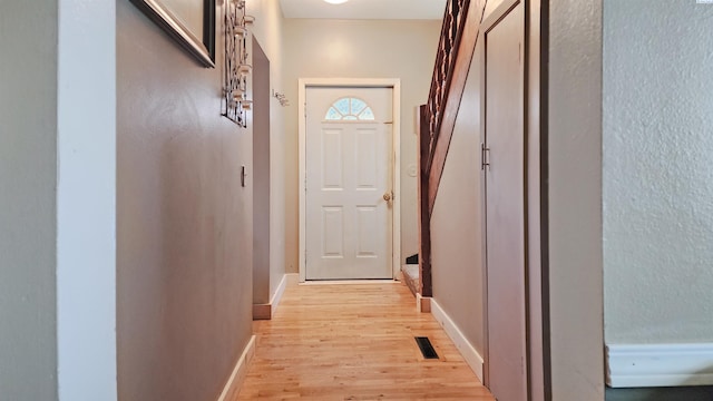 1804 Cedar St, Colfax, WA 99111 - doorway with light wood-style flooring and baseboards