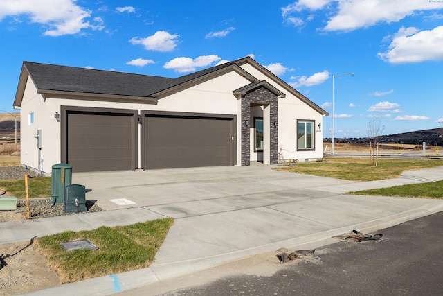 view of front of property with a garage