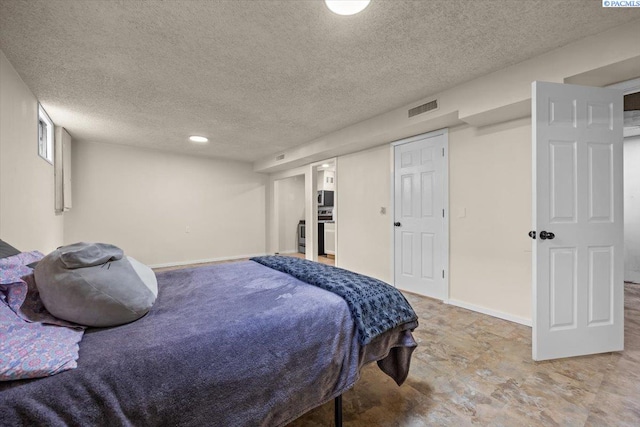 1807 Stevens Dr, Richland, WA 99354 - bedroom with a textured ceiling, baseboards, and recessed lighting