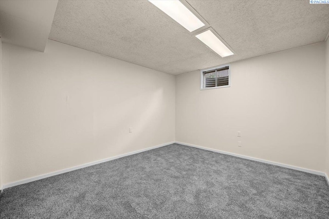 1807 Stevens Dr, Richland, WA 99354 - finished below grade area with a textured ceiling, carpet floors, and baseboards