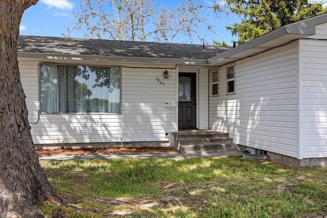 1807 Stevens Dr, Richland, WA 99354 - doorway to property featuring roof with shingles