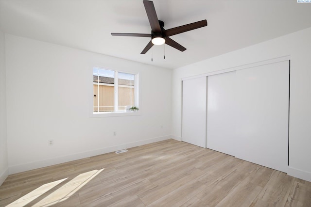 326 Casi Ct, Prosser, WA 99350 - unfurnished bedroom featuring a closet, light wood-type flooring, visible vents, and ceiling fan