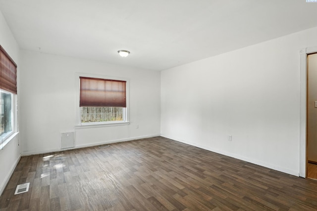 323 S Beech St, Kennewick, WA 99336 - unfurnished room with healthy amount of natural light and dark wood-style floors