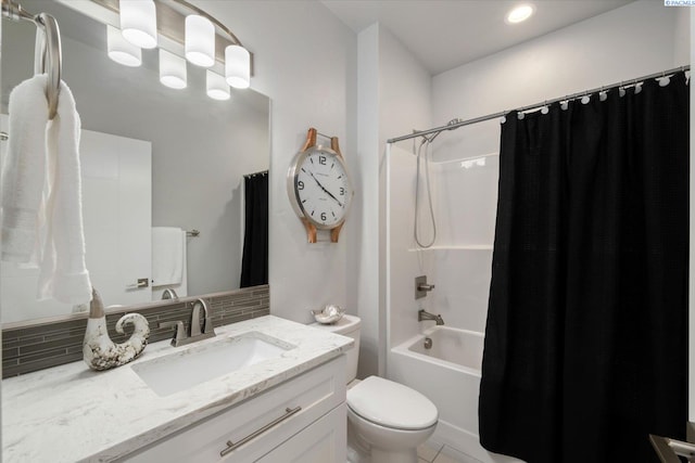 full bathroom featuring toilet, vanity, shower / bath combo with shower curtain, and decorative backsplash