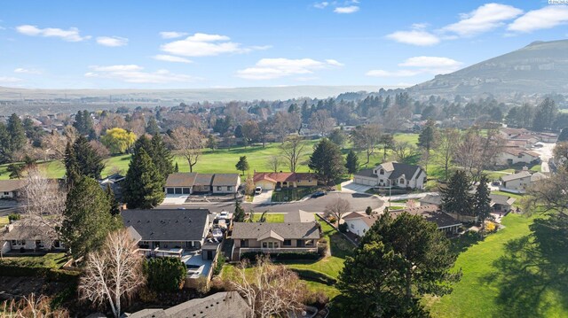 birds eye view of property with a residential view and a mountain view