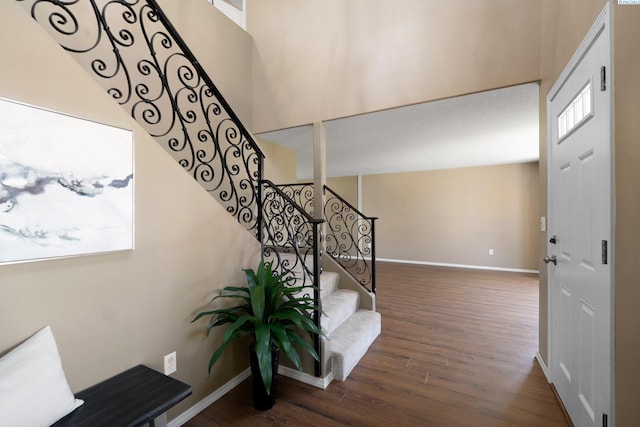 5501 Maui Ct, West Richland, WA 99353 - staircase featuring wood finished floors and baseboards
