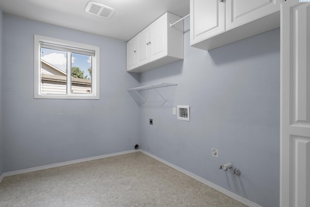 5501 Maui Ct, West Richland, WA 99353 - laundry area featuring hookup for a washing machine, cabinet space, hookup for a gas dryer, and baseboards
