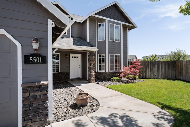 5501 Maui Ct, West Richland, WA 99353 - view of front of property featuring roof with shingles and stone siding