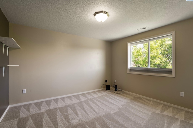5501 Maui Ct, West Richland, WA 99353 - carpeted spare room featuring a textured ceiling and baseboards