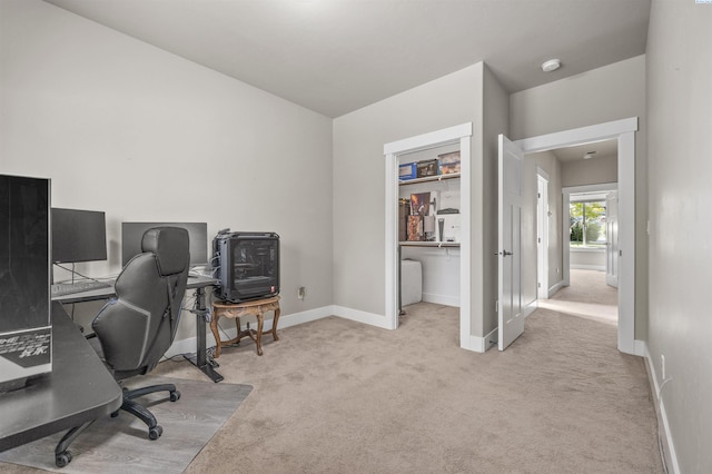 office space with carpet flooring and baseboards