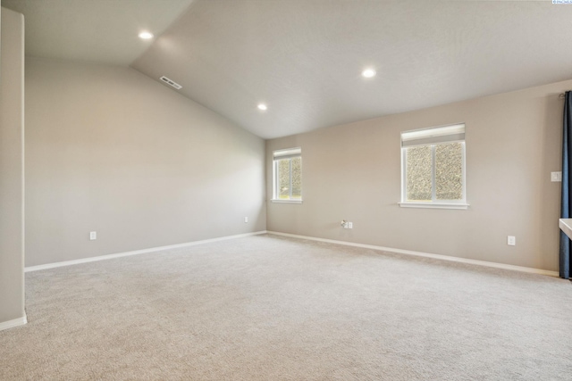 6834 W 25th Ave, Kennewick, WA 99338 - unfurnished room featuring visible vents, recessed lighting, carpet flooring, and lofted ceiling