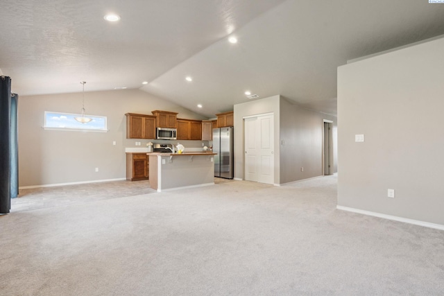 6834 W 25th Ave, Kennewick, WA 99338 - interior space featuring baseboards, recessed lighting, light colored carpet, and lofted ceiling
