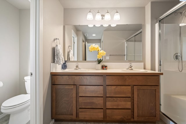 6834 W 25th Ave, Kennewick, WA 99338 - full bathroom featuring a shower stall, tasteful backsplash, a sink, and toilet