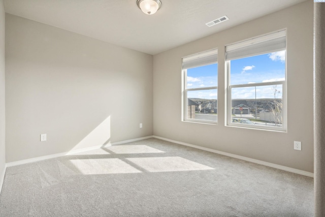 6834 W 25th Ave, Kennewick, WA 99338 - empty room featuring baseboards, carpet, and visible vents