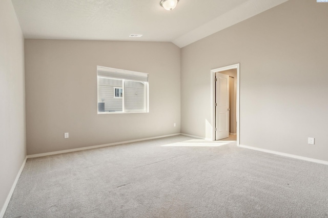 6834 W 25th Ave, Kennewick, WA 99338 - spare room with carpet flooring, baseboards, and lofted ceiling