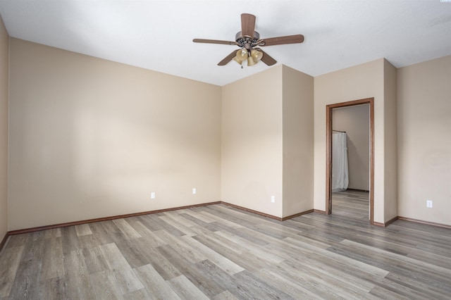 615 N Larkspur Dr, Othello, WA 99344 - spare room with ceiling fan, light wood-type flooring, and baseboards
