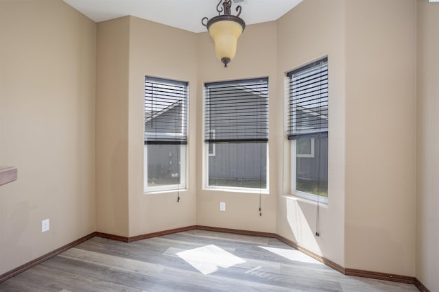 615 N Larkspur Dr, Othello, WA 99344 - unfurnished room with plenty of natural light, light wood finished floors, and baseboards