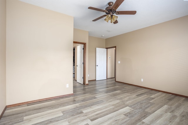 615 N Larkspur Dr, Othello, WA 99344 - unfurnished room with light wood finished floors, baseboards, and a ceiling fan