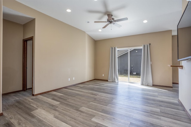 615 N Larkspur Dr, Othello, WA 99344 - unfurnished living room featuring light wood-type flooring, baseboards, a ceiling fan, and recessed lighting