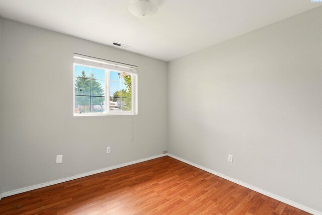 4721 Holly Way, West Richland, WA 99353 - unfurnished room featuring baseboards and light wood-style flooring