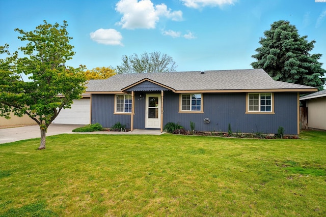 4721 Holly Way, West Richland, WA 99353 - ranch-style house with an attached garage, concrete driveway, and a front lawn