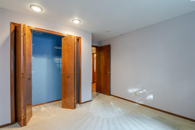 1741 April Loop, Richland, WA 99352 - unfurnished bedroom with light colored carpet and a closet