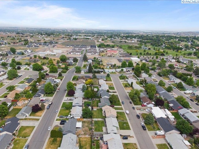 aerial overview of property's location with nearby suburban area