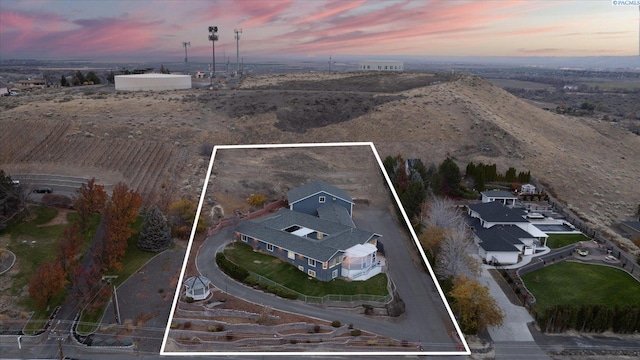 view of aerial view at dusk