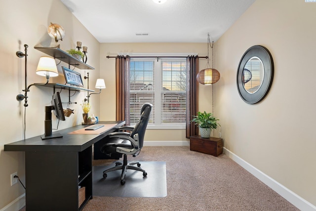 view of carpeted office space