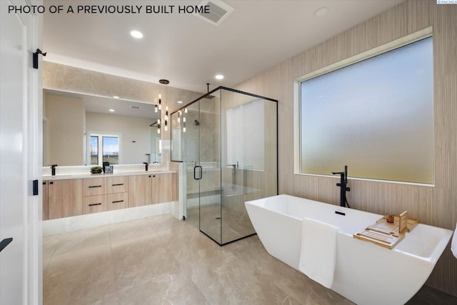 2260 Belfair St Unit 5, Kennewick, WA 99338 - full bathroom with recessed lighting, a shower stall, double vanity, a sink, and a soaking tub