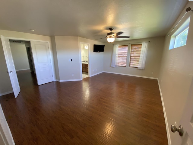 2002 Diamond Head Way, West Richland, WA 99353 - unfurnished living room featuring healthy amount of natural light, ceiling fan, and dark wood-type flooring