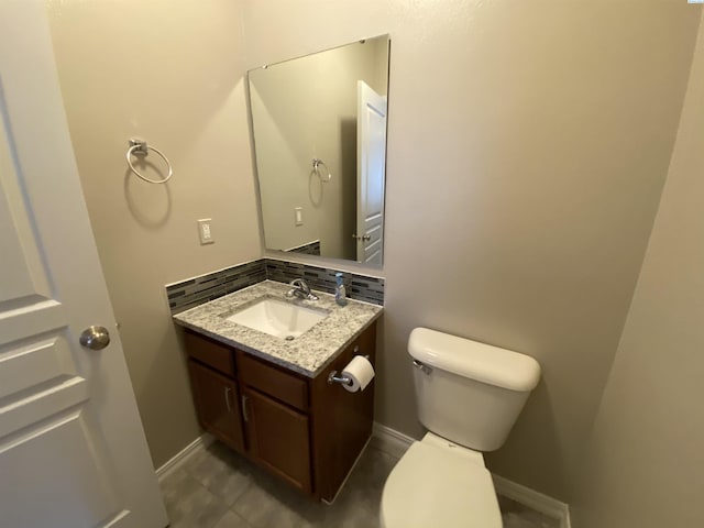 2002 Diamond Head Way, West Richland, WA 99353 - half bathroom featuring vanity, backsplash, and tile patterned flooring