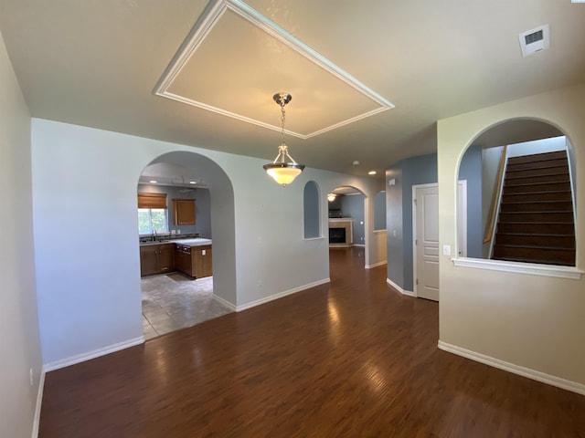 2002 Diamond Head Way, West Richland, WA 99353 - unfurnished dining area with wood finished floors and arched walkways