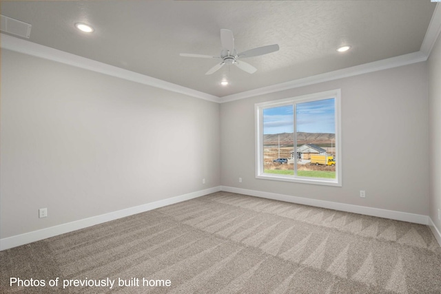 unfurnished room with crown molding, carpet, recessed lighting, a ceiling fan, and baseboards